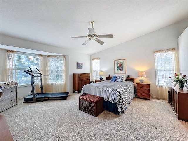 1203 Clays Trl Unit 406, Oldsmar, FL 34677 - bedroom with lofted ceiling, a textured ceiling, light carpet, and a ceiling fan