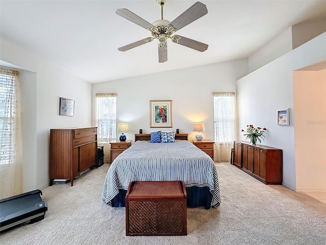 1203 Clays Trl Unit 406, Oldsmar, FL 34677 - bedroom with light carpet, ceiling fan, vaulted ceiling, and baseboards