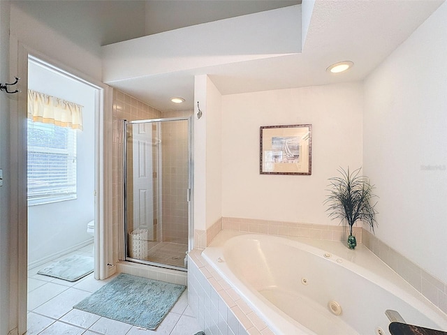 1203 Clays Trl Unit 406, Oldsmar, FL 34677 - bathroom with toilet, recessed lighting, a shower stall, tile patterned floors, and a whirlpool tub