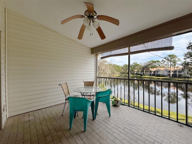 1203 Clays Trl Unit 406, Oldsmar, FL 34677 - sunroom featuring lofted ceiling, a water view, and a ceiling fan