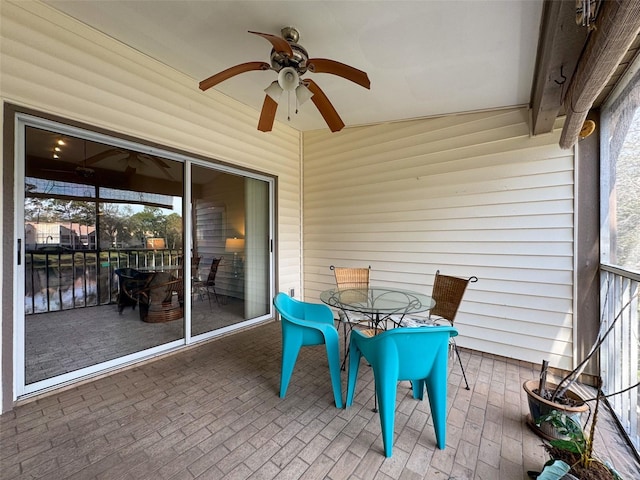 1203 Clays Trl Unit 406, Oldsmar, FL 34677 - unfurnished sunroom featuring a ceiling fan