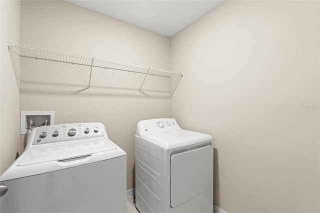 laundry room featuring washer and clothes dryer