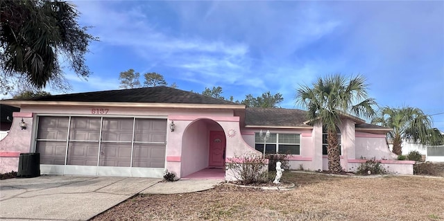 single story home with a garage