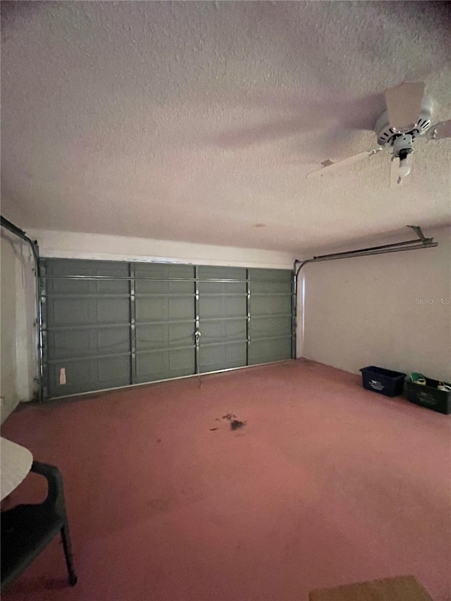 garage with ceiling fan