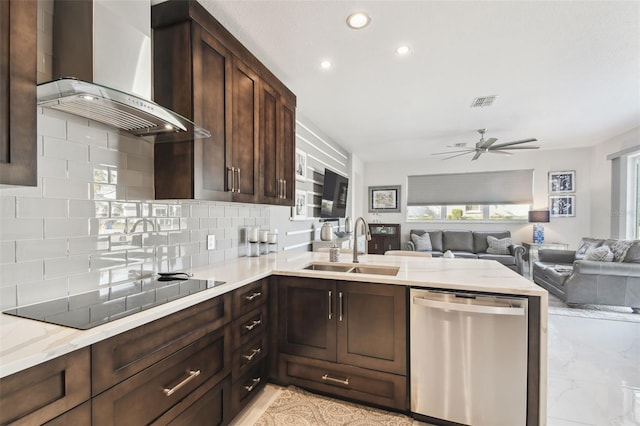 kitchen with sink, tasteful backsplash, black electric cooktop, dishwasher, and wall chimney range hood