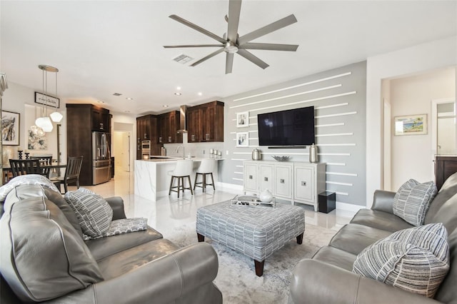 living room featuring ceiling fan