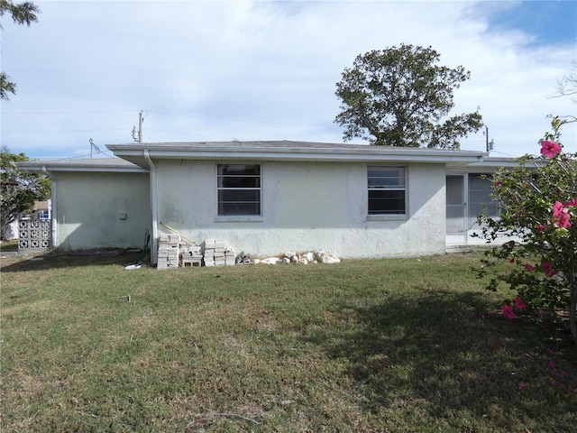 view of home's exterior featuring a yard