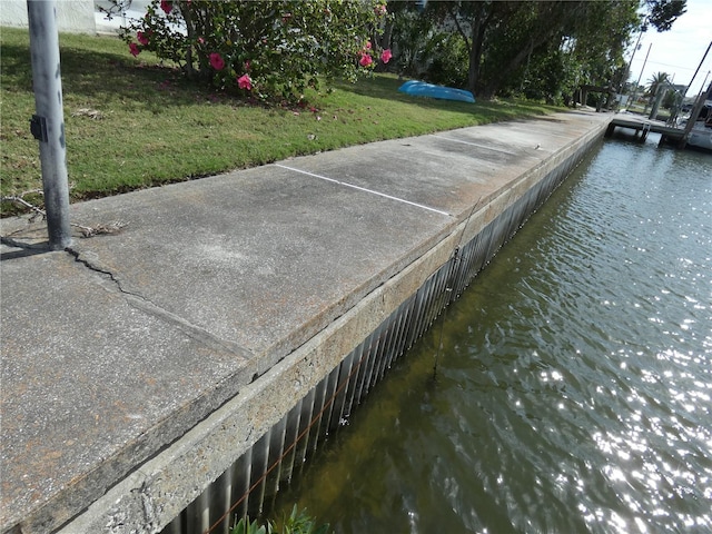 13737 Michelle Ave, Hudson, FL 34667 - dock area with a water view and a lawn
