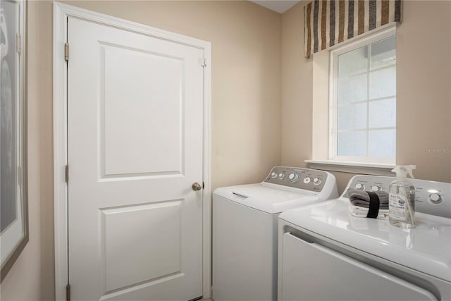 laundry room with washer and dryer