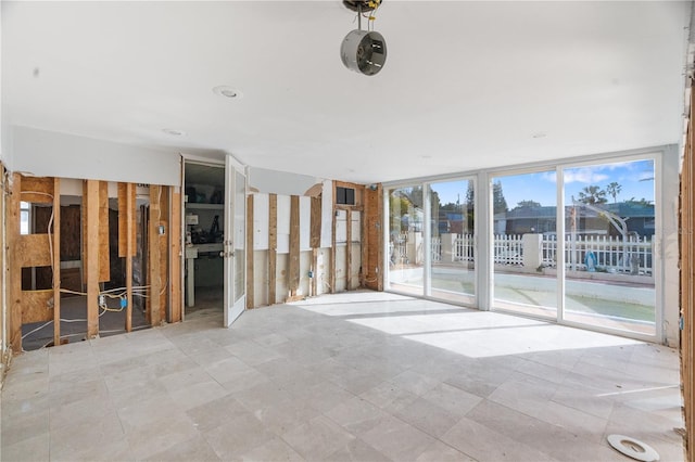 interior space featuring floor to ceiling windows