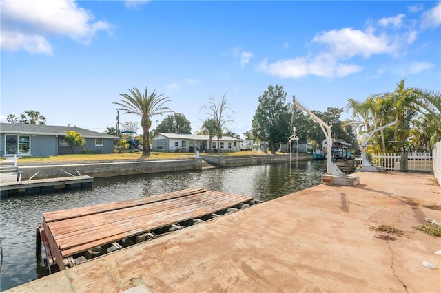 dock area with a water view