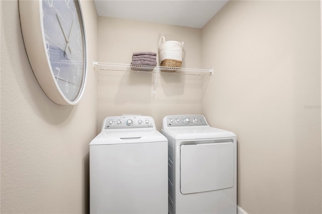 laundry room featuring washer and dryer