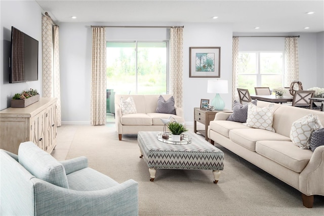 living room with light colored carpet