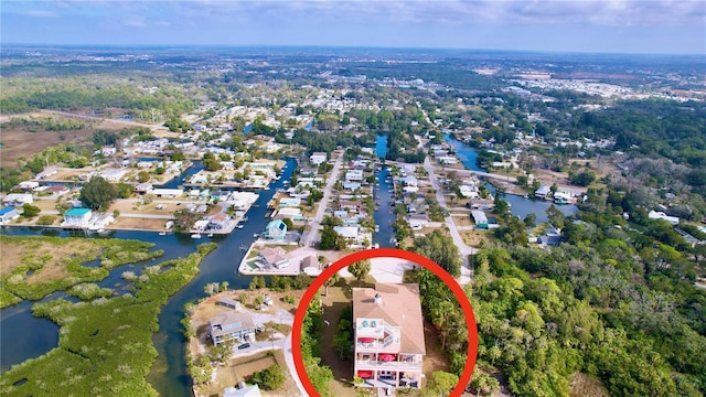 bird's eye view with a water view