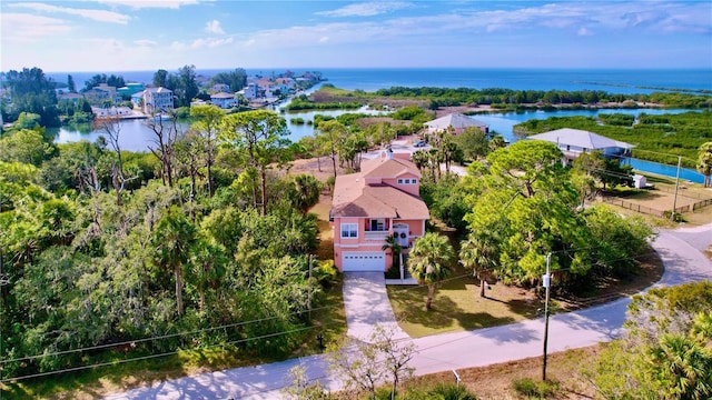 drone / aerial view featuring a water view