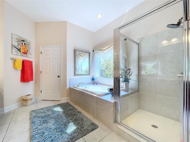 bathroom featuring tile patterned floors and plus walk in shower