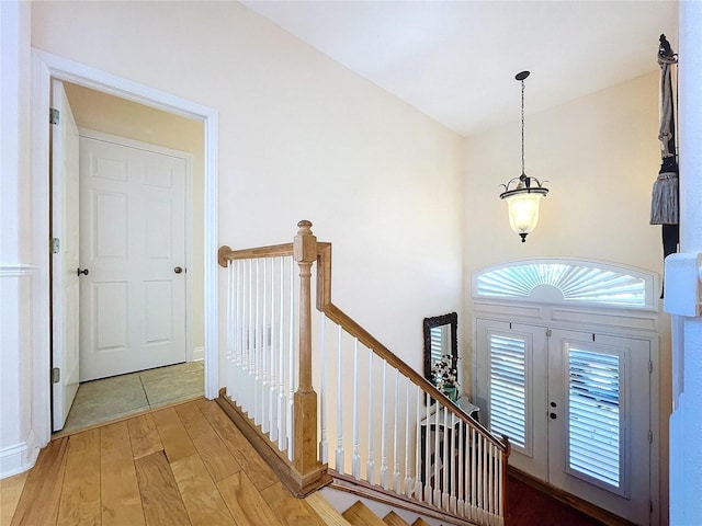 entryway with wood-type flooring