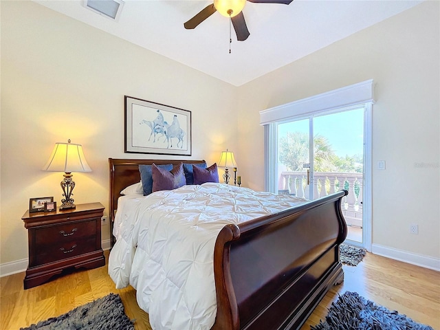 bedroom with ceiling fan, access to outside, and light hardwood / wood-style floors