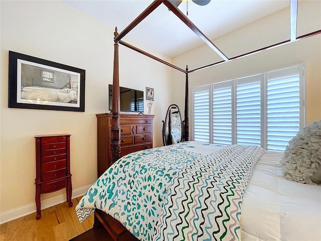 bedroom with hardwood / wood-style floors