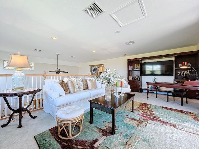 living room featuring light carpet