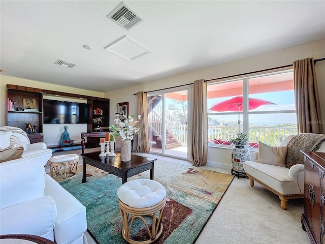 living room featuring light colored carpet