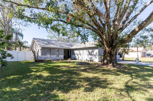 ranch-style house with a front yard