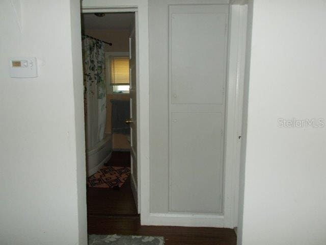 hall featuring dark hardwood / wood-style flooring