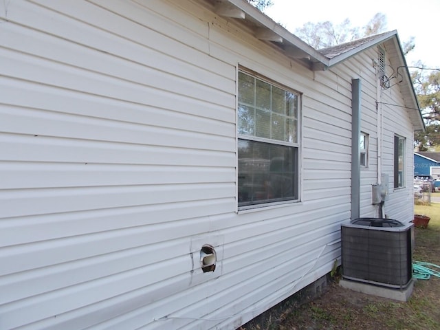 view of property exterior featuring central AC unit