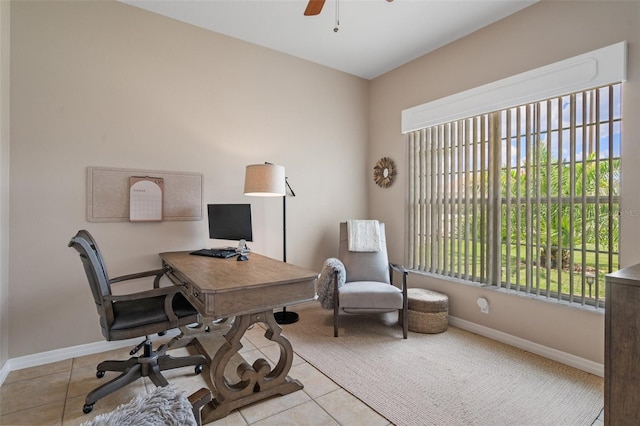 tiled home office with ceiling fan