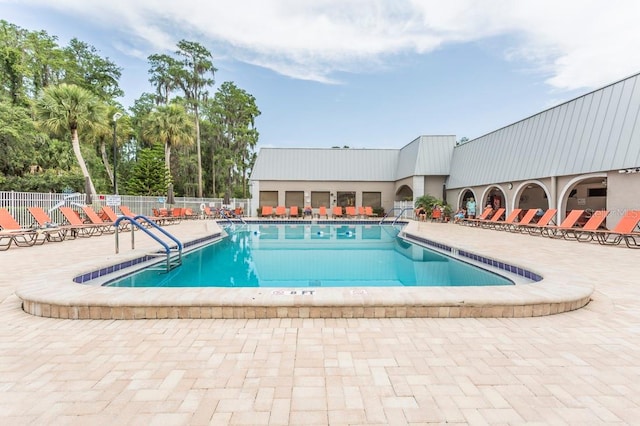 view of pool with a patio area