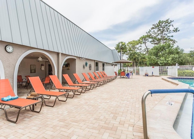 view of swimming pool with a patio