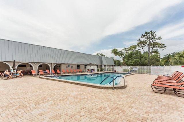 view of pool featuring a patio