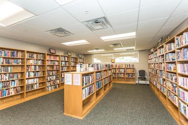 interior space featuring a paneled ceiling