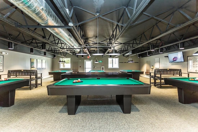 playroom with pool table, a healthy amount of sunlight, carpet, and a high ceiling