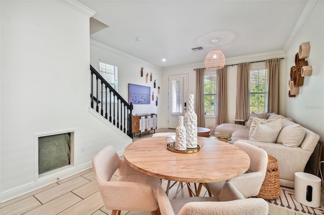 dining room with ornamental molding