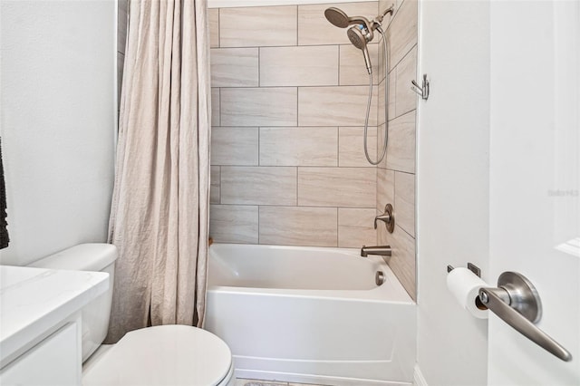 bathroom featuring shower / bathtub combination with curtain and toilet