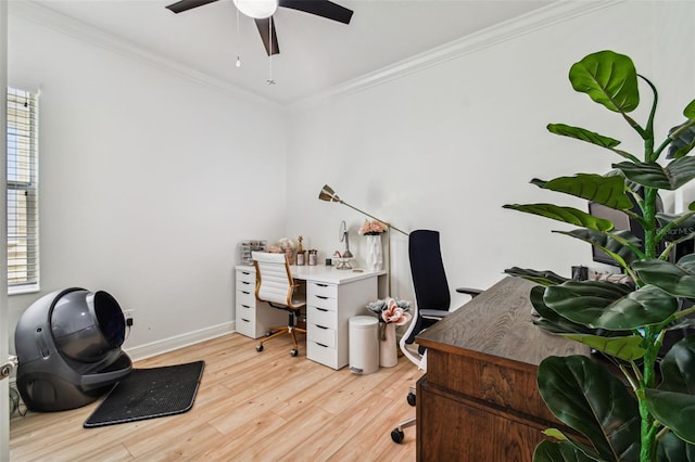 office area featuring crown molding, ceiling fan, and light hardwood / wood-style floors