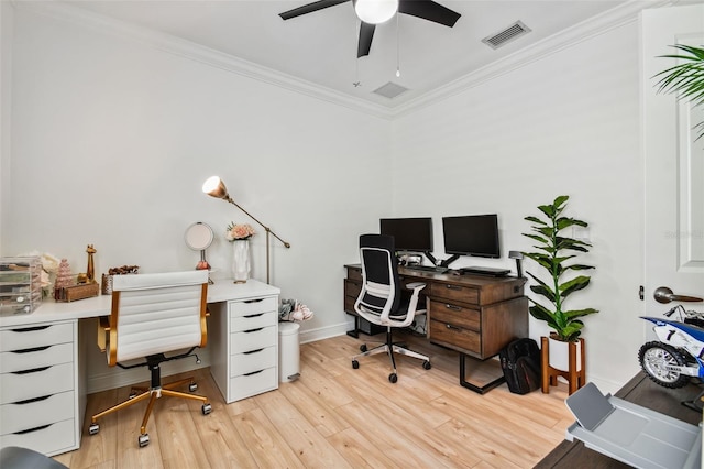 office with light hardwood / wood-style flooring, ornamental molding, and ceiling fan