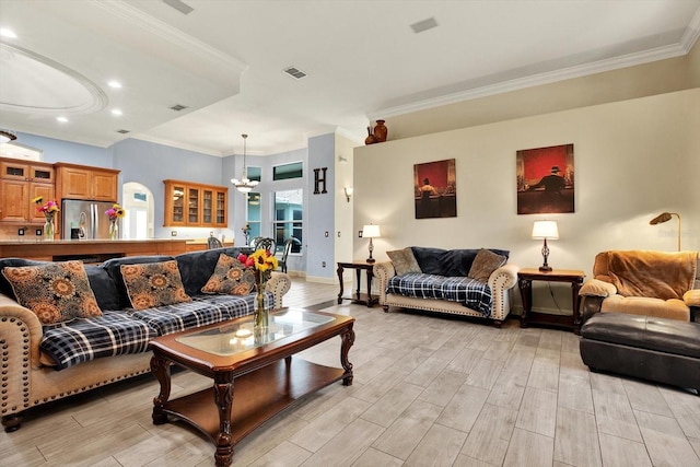 living room featuring crown molding