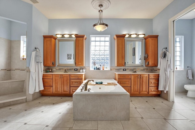 bathroom with vanity, a bidet, tile patterned floors, and plus walk in shower