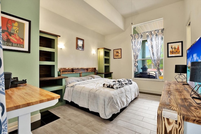 bedroom featuring light wood-type flooring