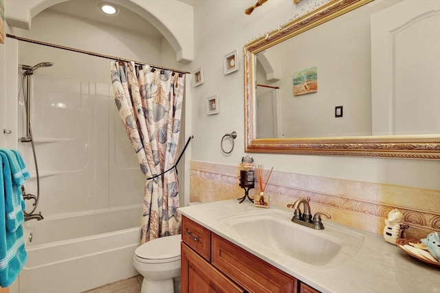 full bathroom featuring vanity, toilet, and shower / bath combo