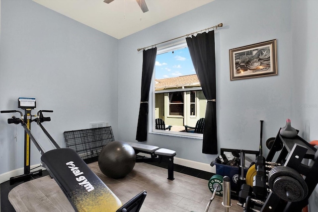 workout room with ceiling fan