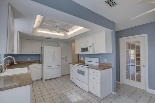 kitchen with ceiling fan, sink, white cabinets, and white appliances