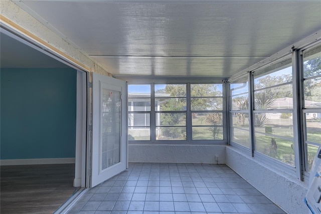 view of unfurnished sunroom