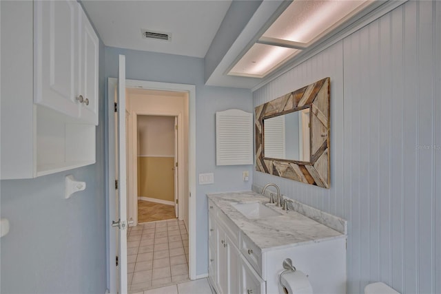 bathroom featuring vanity and tile patterned flooring