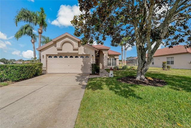 view of front facade featuring a garage and a front lawn