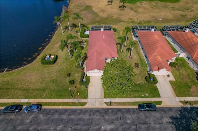 drone / aerial view with a water view