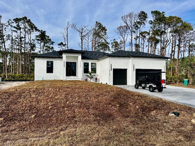 view of front of home with a garage