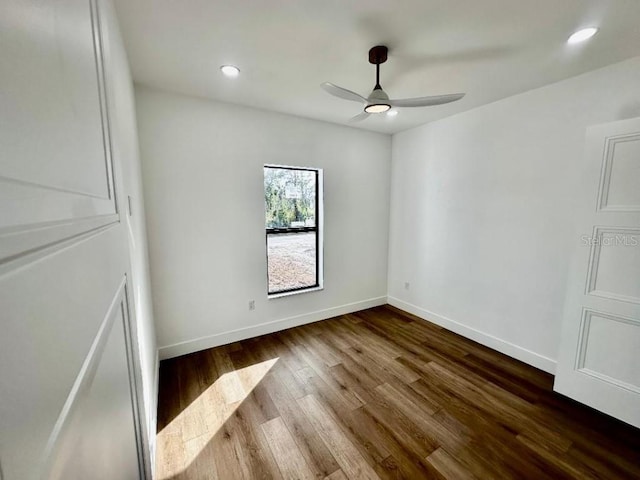 unfurnished room with hardwood / wood-style flooring and ceiling fan